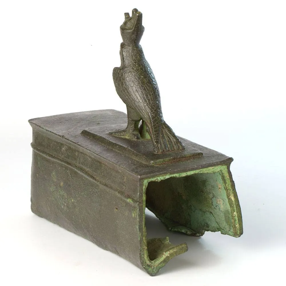 An Egyptian Bronze Horus Falcon on a Sarcophagus, 26th Dynasty, ca. 646-525 BCE