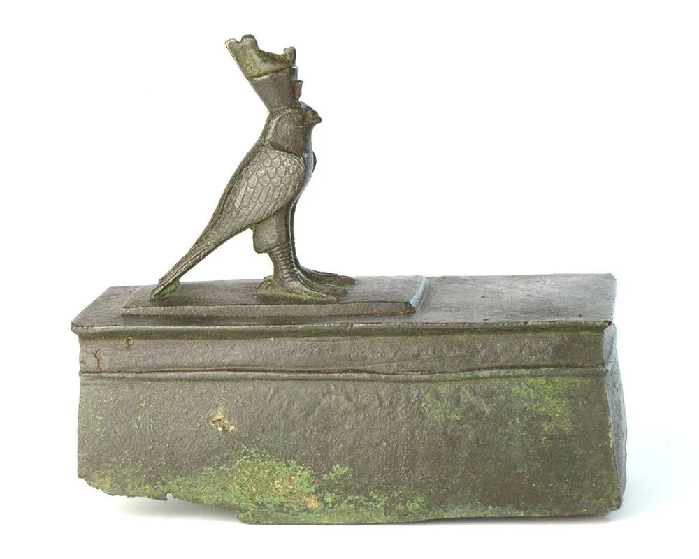 An Egyptian Bronze Horus Falcon on a Sarcophagus, 26th Dynasty, ca. 646-525 BCE
