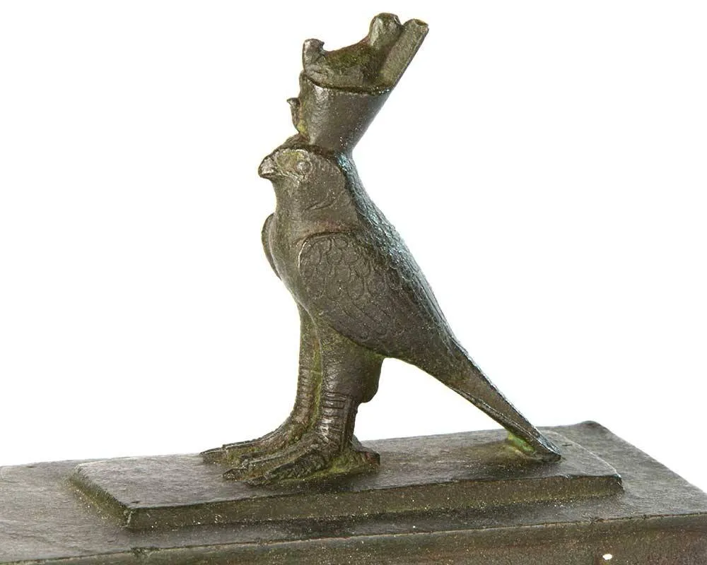 An Egyptian Bronze Horus Falcon on a Sarcophagus, 26th Dynasty, ca. 646-525 BCE