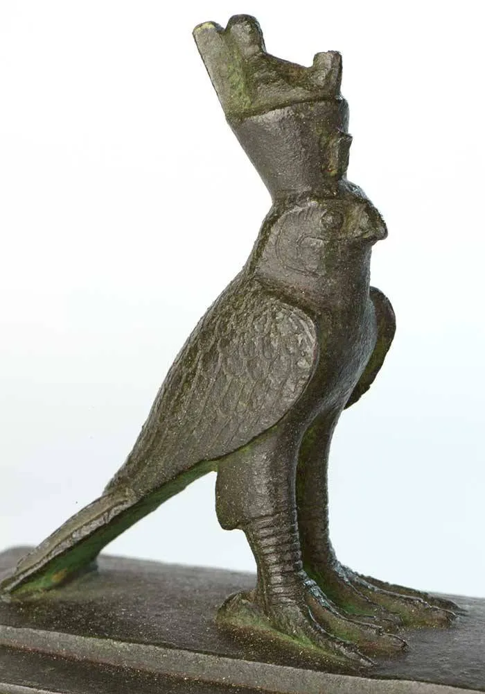 An Egyptian Bronze Horus Falcon on a Sarcophagus, 26th Dynasty, ca. 646-525 BCE