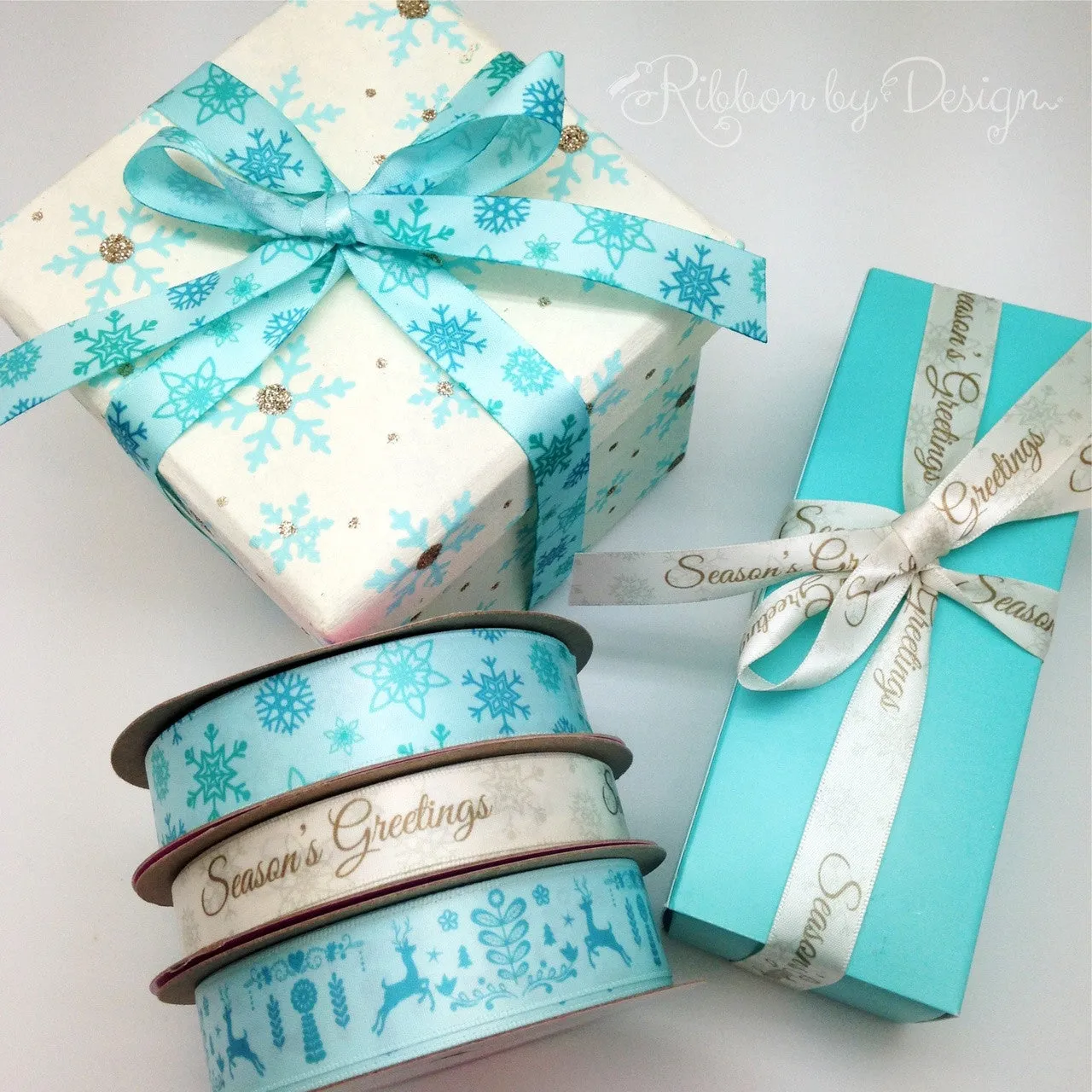 Snowflakes Ribbon in blue on 5/8" Ice Blue Single Face Satin Ribbon