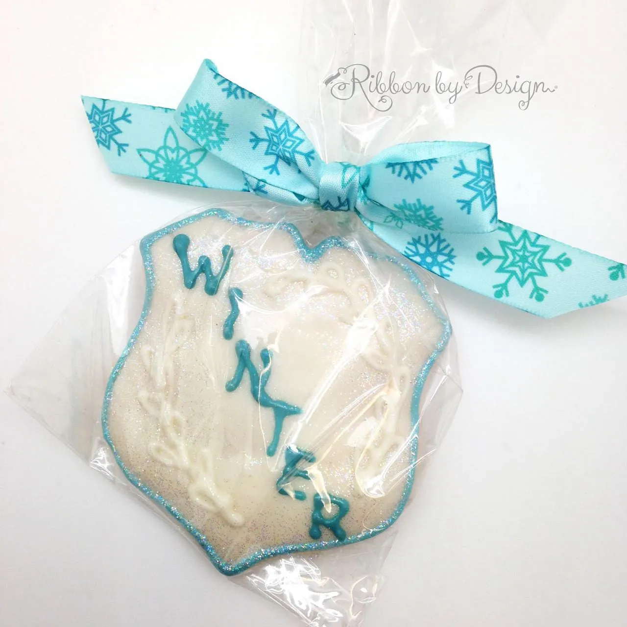 Snowflakes Ribbon in blue on 5/8" Ice Blue Single Face Satin Ribbon